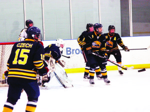 The Caledon Golden Hawks wrapped up the 2013-14 season with a final informal game of pick-up hockey on their home ice at Caledon East. The Hawks finished the regular season in fourth spot in the Georgian Mid Ontario Junior C Hockey League before going out in the first round of the playoffs. Photo by Brian Lockhart