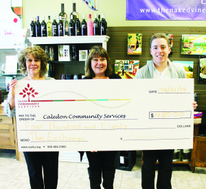 CONTRIBUTION TO THE EXCHANGE A Feb. 23 wine-tasting event at The Naked Vine in Bolton helped raise a $480 contribution to The Exchange, which is run by Caledon Community Services (CCS). Vera Robinson and Candice Plibersek of The Naked Vine recently presented the cheque to Robert Simeon, event planner with CCS. Photo by Bill Rea