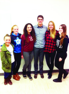 Swimmers Tess Routcliffe, Taylor McAuley, Alia Meyers, Kira Eggengoor, Emily Osborne are seen here with Olympian Keith Beavers (third from right).
