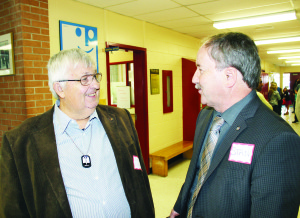 Don Manson, who was principal at Credit View from 2002 to 2006 was chatting with Trustee Stan Cameron.