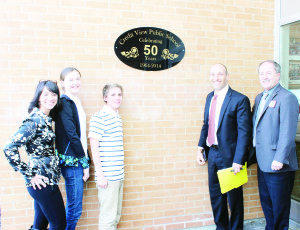 It was a time for celebration recently at Credit View Public School near Cheltenham. The school was marking 50 years of education in the community. The celebration included the unveiling of this plaque to mark the occasion. School Council Chair Theresa Dixon and her son, Student Council Prime Minister Ryan Dixon, flanked Vice-Prime Minister Kady Wellman as Principal David Abela and Trustee Stan Cameron unveiled the plague. “I'm quite at home here, in our small and mighty school,” Ryan commented during the ceremony. Photos by Bill Rea