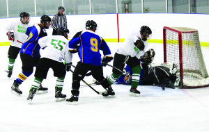 The Garden Foods Grinders were trailing entering the third period of Sunday's match, but they put the pressure on the OPP Road Runners goal, finally tying the game in the last minute on a penalty shot.