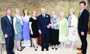 Paul Egan was flanked by his family, including his sister Deborah Brook and her husband Hal (left) daughters Elaine and Heather, wife Lynne, sister Lois Madill, daughter Kim and her husband Alan Heppell at Saturday's celebration.