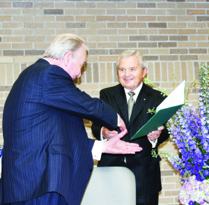 Murray Stewart represented Dufferin-Caledon MP David Tilson in presenting certificates from the Prime Minister and Governor General to Paul Egan.