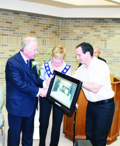 Mayor Marolyn Morrison and Councillor Rob Mezzapelli presented a Cory Trepanier print to Paul Egan.