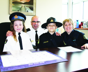 Inspector Tim Melanson and Constable Brenda Evans last Thursday welcomed acting detachment commander Milaina Prezzano and acting staff sergeant Kelvin Dahri to their posts for the day.