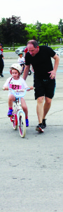Frank Svab or Caledon East was accompanying his daughter Dalma, 5, along the cycling portion of the race.