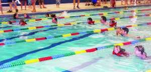 The competition started in the pool, with parents allowed to accompany the young participants.