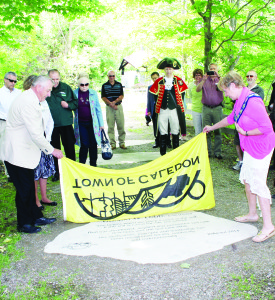 Terra Cotta area resident Donald Lobb was helped by Mayor Marolyn Morrison in unveiling his stone on Caledon's Walk of Fame Saturday.