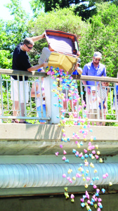 Wayne Melnechuk and Sheri Fowler were in charge of dumping the ducks into the river for the popular Duck Race.