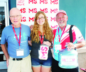 RAISING MONEY FOR MS Cedar Mills resident Julie Dranitsaris was out at the Bolton Walmart SuperCentre over a recent weekend for her sixth annual fundraiser to fight Multiple Sclerosis. She was assisted by her father Steve and uncle Bill Bates. Photo by Bill Rea