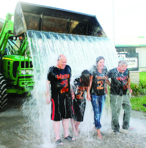 Municipal candidates in Ward 2 got their chance to get cold water dumped on them last Thursday at Armstrong Manor Farm. Allan Thompson, Yevgenia Casale, Johanna Downey and Gord McClure are seen here getting soaked.