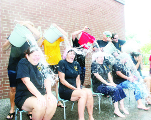 MACVILLE DOES IT'S BIT TO FIGHT ALS The Ice Bucket Challenge has not yet run its course. The international fundraiser to fight Amyotrophic Lateral Sclerosis (ALS), also known as Lou Gehrig's disease, has spread to the local schools. Students at Macville Public School got the thrill last week of seeing ice-cold water dumped on some of their teachers, by other staff members. Catherine Horn, Leslie Chateanvert, Mary-Ann Dacres, Murray Heslop and Brandon Pachan got the honours of dumping water on Liz Gilchrist, Louise Milliken, Principal Kelly Kawabe, Karen Moberly and Jessie Donohue. Photo by Bill Rea