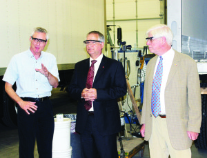 MultiVans co-owner Steve Schafer was showing FedDev Ontario Minister Gary Goodyear and Dufferin-Caledon MP David Tilson around the floor of the Bolton plant. Photo by Bill Rea