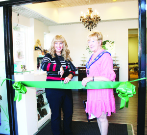 GLAM GOES GREEN OPENS IN BOLTON Mayor Marolyn Morrison was on hand recently to assist Lisa Morgan with the grand opening of Glam Goes Green on King Street East in the Royal Courtyards in Bolton. The shop specializes in non-toxic, gluten-free body and skin-care products. Photo by Bill Rea