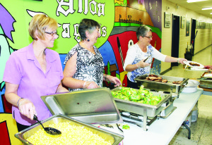 Irene Kerby, Heather Thompson and Heather Jean Saunders were busy serving the food for the hungry diners.