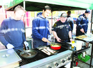 Fire Prevention Week marked in Bolton Personnel from the Bolton Fire Hall marked Fire Prevention Week Saturday with an open house, complete with a pancake breakfast. Fire Fighters Martin McCulloch and Angelo DiBenedette joined Mono Mills District Chief Brian Zimmerman and Fire Fighter John Campregher with the cooking chores. And there were lots of hungry people on hand for a good breakfast, like Jonathan Perez, 3, of Bolton. Photos by Bill Rea