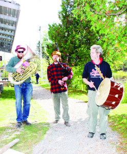 People taking part in Stonefest 2014 were entertained by these musicians who were walking through the grounds; Colin Couch, Henry Muth and Andrew Henry from Guelph.