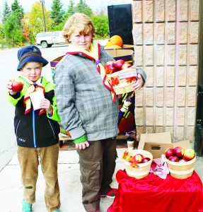 Beaver Malcolm Neilson and Scout Andrew Noack of the 1st Caledon East Scouts were doing business outside the local Foodland. Photos by Bill Rea