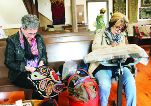 The event also included a Hooked Rug Show and Sale. Cheryl Hazelton of Glen Williams and Debbie Pirtobshek of Caledon East were working on creations.