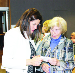 Johanna Downey was looking over figures with area resident Anne Livingston in the council chambers election night, as the returns came in.