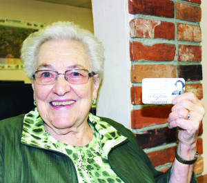 Doris Porter shows her ID, after 17 years.