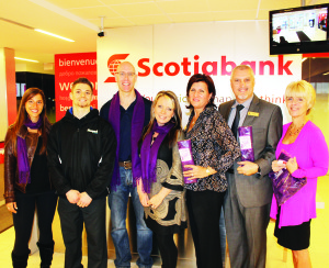 Showing support for the Wrapped in Courage campaign are Jennifer DiGregorio of Healthetica, Luke Bernardi of Amped Nutrition, Stephen Bunyan of Bodhi Wellness, FTP's Manager of Development and Community Relations Stacey Tarrant, Scotiabank Customer Service Supervisor Rosa Evangelista, Branch Manager Frank Macellaio and Customer Service Rep Sharon Sarini. Photo by Bill Rea