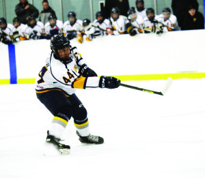 Cody Forgione puts a puck on net on the powerplay in last Sunday's 8-2 loss to the Stayner Siskins.