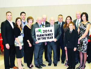 Members of the Johnston family were on hand to receive recognition at Peel's Farm Family of the Year Saturday night. Seen here are Mike and Sabrina Eels, Brian Wilson, Betty and Paul Johnston, Mike Burns, Jim Johnston, Tony Comella, Teresa Johnston, Jonathan Gray, and Paul and Lynnette Gray.