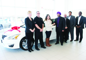 On hand for the presentation of the key to Maria Damjanoski was Nicole Michalski of Nissan Canada, Service Manager Cam Barrie, General Sales Manager Kuljit Batra, Dimitri Dariviris, vice-president of auto planning at Bolton Nissan, Brad St. Louis of Nissan Canada, and Nigel Smith, senior manager of marketing, sales and after sales with Nissan Canada. Photos by Bill Rea