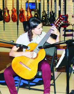 OPEN MIC NIGHT There was lots of great classical guitar music recently at The Archtop Cafe in Bolton. The event was an Open Mic Night open to anyone who wanted to play, or just listen. One of those who came to perform was Beatriz Martin from Richmond Hill Photo by Bill Rea