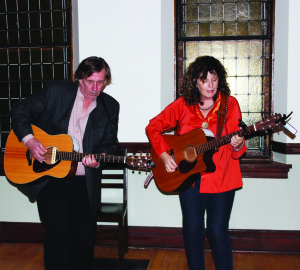 FRASER AND GIRARD PERFORM AT CLAUDE The Parlour Concert series at Claude Church on Highway 10 continued recently with a performance by Fraser and Girard, consisting of Allan Fraser and Marianne Girard of Orangeville. They had a good crowd out for their offering of guitar folk music. Photo by Bill Rea