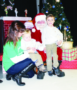 Santa Claus was major attraction. Mary Smercina brought 18-month-old Andrew and five-year-old Ethan to see him. Photos by Bill Rea