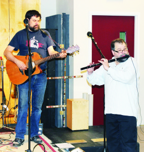 GLENN MCFARLANE PERFORMS IN BOLTON Brampton Folk Club President and long-time member of the Celtic and East Coast duo Brown Ale Glenn McFarlane was performing recently at Bolton United Church, giving him a chance to play some numbers from his new CD Music and Friends. Les Smith was accompanying him on the Irish flute. Photo by Bill Rea