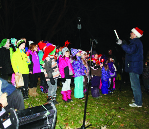 Palgrave celebrates the season There was a large crowd of festive people out in Palgrave Saturday evening for the annual Tree Lighting celebration. There was lots of music, as well as hot drinks from Palgrave Rotarians. The Palgrave Public School Choir sang some of the tunes of season. Photo by Bill Rea