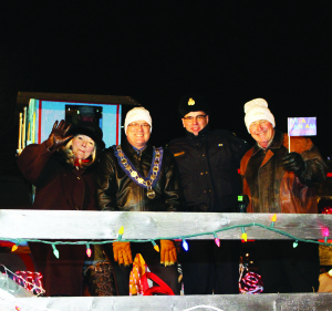 Riding on the Town of Caledon Float was Councillor Barb Shaughnessy, Mayor Allan Thompson, Inspector Tim Melanson of Caledon OPP and Councillor Doug Beffort.
