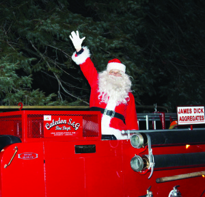 The Caledon Village Association had a big welcome already for Santa Claus Saturday night, putting on their biggest parade ever. The parade formed up in the parking lot of Caledon Central Public School and made its way through the village to Knox United Church for a community celebration. Santa Claus travelled in the parade in style, with help from Caledon Fire and Emergency Services.