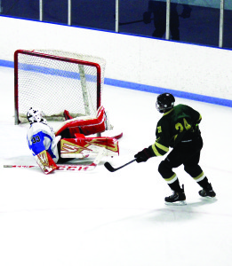 Noah DoPaco scores his first of two goals last week in Robert F. Hall's 4-1 win over St. Marguerite D'Youville.