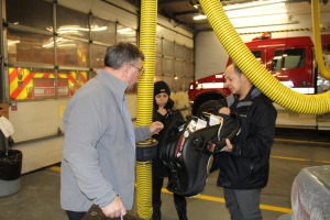 OPP HOLDS CHILD CAR SEAT CLINIC Auxiliary officers of Caledon OPP recently held the latest in their series of child car seat clinics at the fire hall in Bolton. Auxiliary Sergeant Jim Drake was explaining some of the points of seat installation to Dina and Nader Khouzam of Brampton. The next clinic is scheduled for Feb. 24, from 6:30 to 8:30 p.m. at the fire hall on Ann Street in Bolton. It will be by appointment only. For more information, or to book an appointment, call 905-584-2241. Photo by Bill Rea