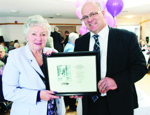 HAPPY BIRTHDAY HEATHER Mayor Allan Thompson was among the many on hand Sunday at Rotary Place to help wish Heather Broadbent a happy 80th birthday. The Bolton resident and retired Heritage Resource Officer for the Town of Caledon marked the big milestone last week. Photo by Bill Rea