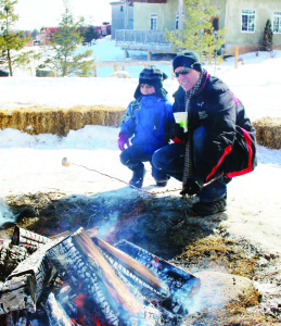 What would a winter festival be without the toasting of marshmallows? Anthony Marrari of Toronto was showing his son Cristian, 8, how it's done.