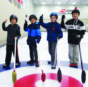 Nine-year-old skip Cody Jitta (far right), seen here with team mates lead Ethan Olivera, 9, second Adrian Spataro, 11, and vice David Maan, 11, led his team to victory at the Little Rock with a Heart Bonspiel held at the Chingaucousy Curling Club.