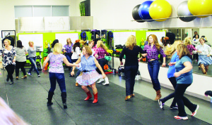 EVENING OF LINE DANCING Revive Fitness of Bolton was the scene last Friday night of a free Line Dancing Class, open to the community for fun and socializing with exercise. The floor of the facility was packed with dancers and spectators as Revive Fitness proprietor Lee-Anne Simpson led the proceedings.          Photo by Bill Rea