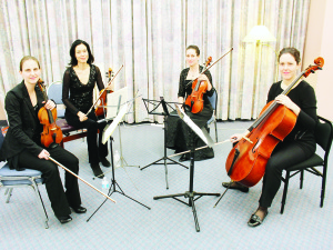 MADAWASKA QUARTET PERFORMS The latest offering of the Caledon Chamber Concerts series featured the Madawaska Quartet, presenting a program that included works by Mozart, Ervin Schuloff and Bedrich Smetana. The quartet includes Amita Walsh on Violin, Sarah Fraser-Raff on violin, Anna Redekop on viola and Amber Ghent on cello. Photo by Bill Rea