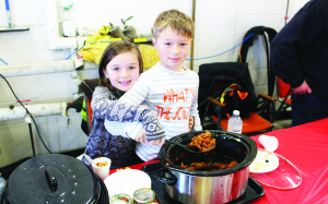 Lots of chili for a good cause The bays at the Fire Hall in Cheltenham were empty of trucks Saturday, but filled with hot stuff, as the seventh annual Chili Show Down was held in support of the Heart and Stroke foundation.Ryan Lyons, 8, and her brother Logan, 10, were serving up this chili, which they said was “made with a ton of love.”