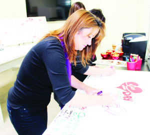 Tammy Elliott of Bolton was among those drawing hearts at the recent HeartEsteem event at the Exchange.