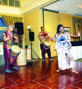 ENTERTAINMENT AT TASTE OF AFRICA EVENT King College School held their annual Taste of Africa fundraiser Saturday night at Caledon Woods Golf Club in support of its sister school in Kumba, Cameroon. Entertainment was provided by Alpha Rhythm Roots. Derek, Alpha and Walter hit the drums for the dancing of Coco. Photo by Bill Rea