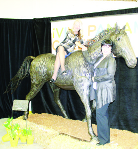 King resident Kendall McCulloch created this horse sculpture made of steel rebar, gearing up for a busy equestrian season, and the fanfare associated with the Pan Am Games. Councillor Barb Shaughnessy was riding it side-saddle, accompanied Anne Thompson.