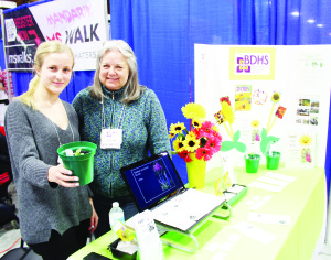 Members of the Bolton and District Horticultural Society were represented at the Show, promoting sunflowers. Jessica Heenan and her grandmother Brenda were running the booth here.