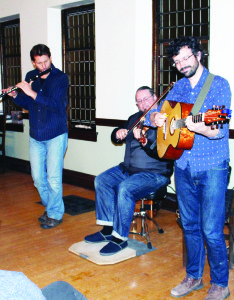 GENTICORM PERFORM AT CLAUDE There was a good crowd out recently in the hall at Claude Church on Highway 10 to hear the traditional French-Canadian tunes of Genticorm. The group consists of Nicholas Williams and Pascal Gemme from the Eastern Townships, and Yann Falquet from Montreal. Photo by Bill Rea